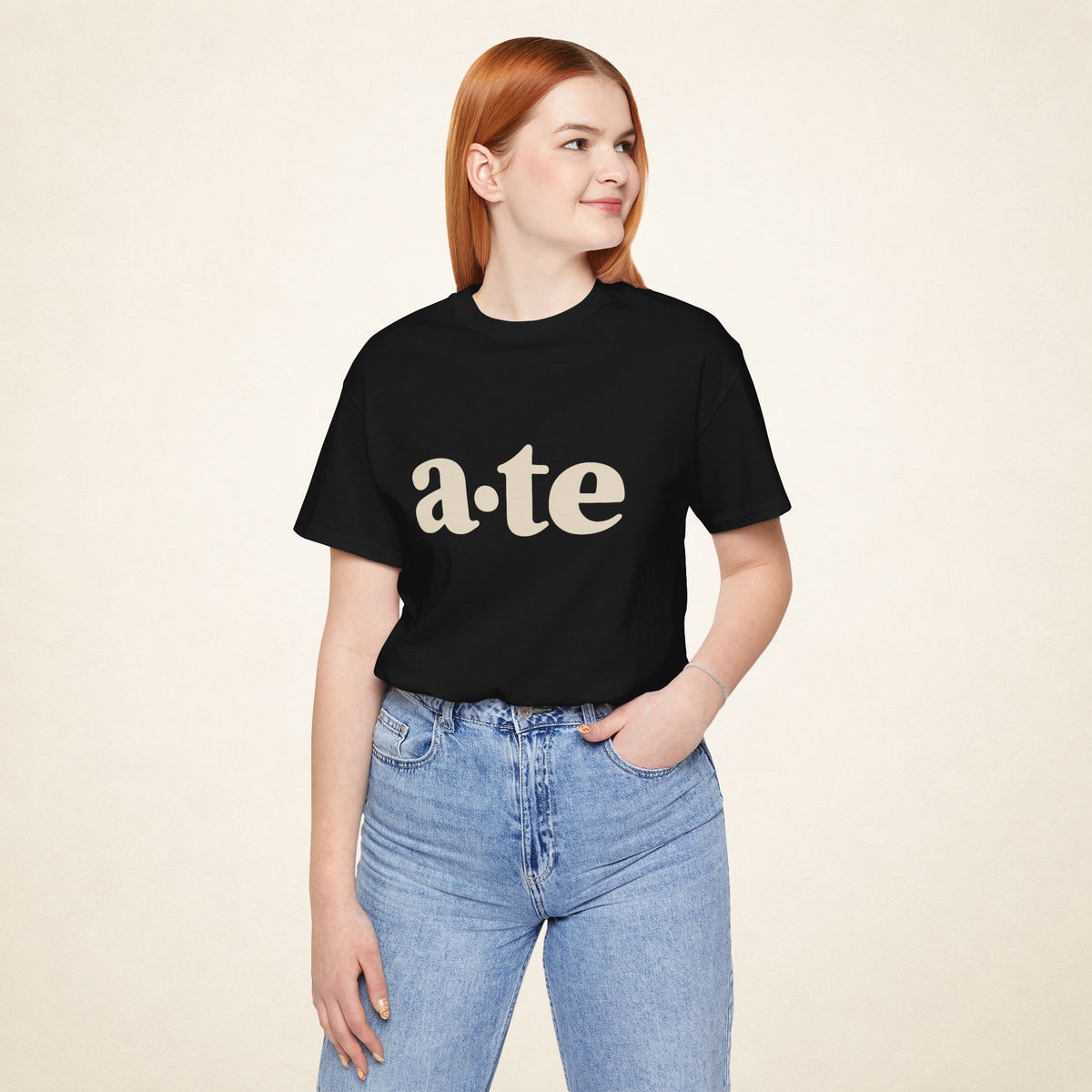 Model wearing the Black ATE Filipino T-shirt from MadeInPinas, front view showing a·te lettering.