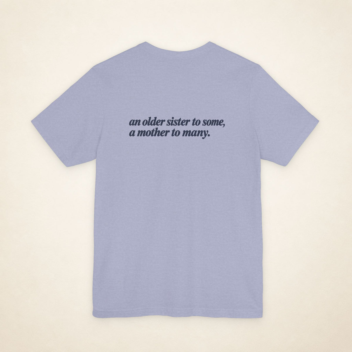Heather Blue ATE Filipino T-shirt, flat-lay back view with the message “an older sister to some, a mother to many.”