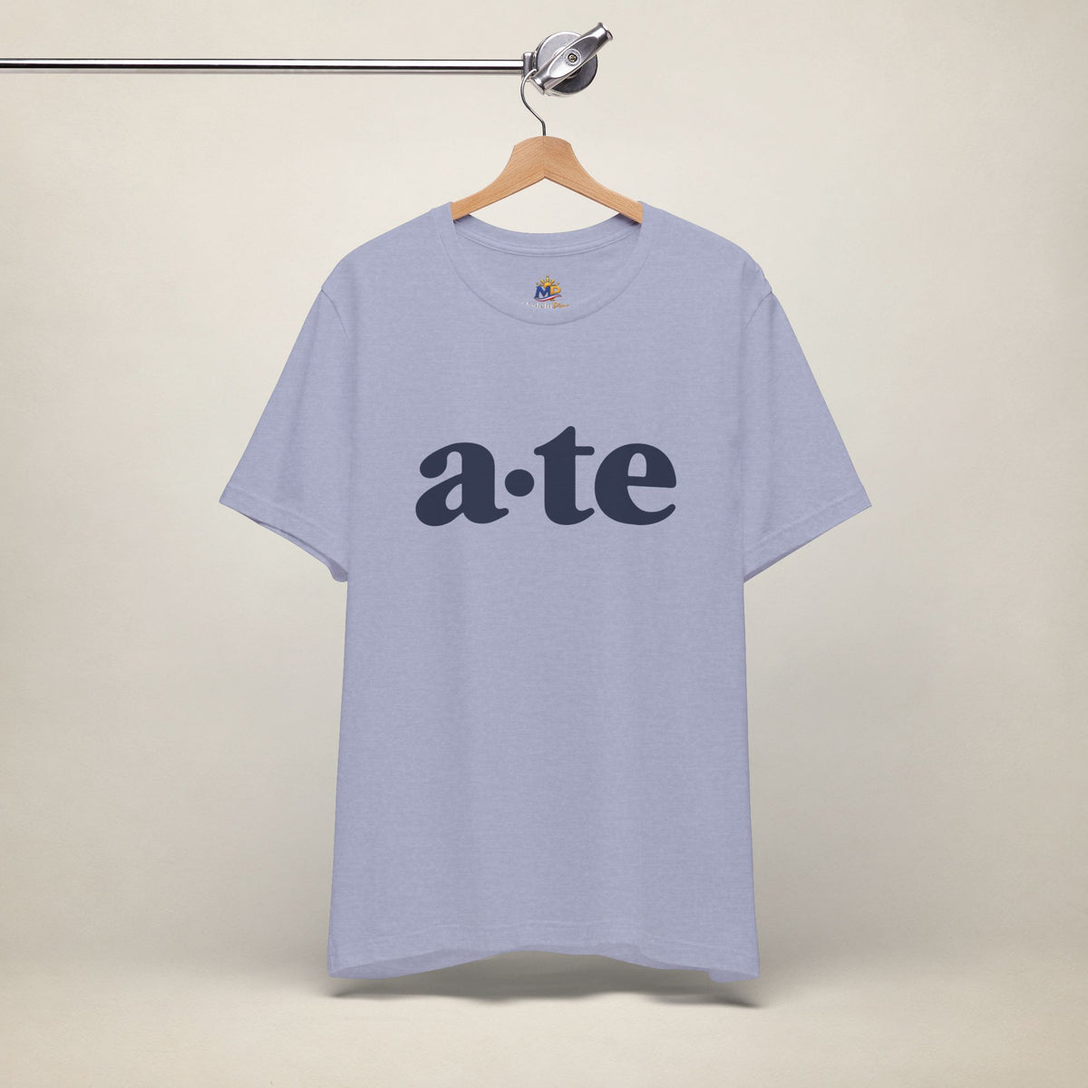 Heather Blue MadeInPinas ATE Filipino T-shirt on a hanger, front view with minimalist a·te lettering.