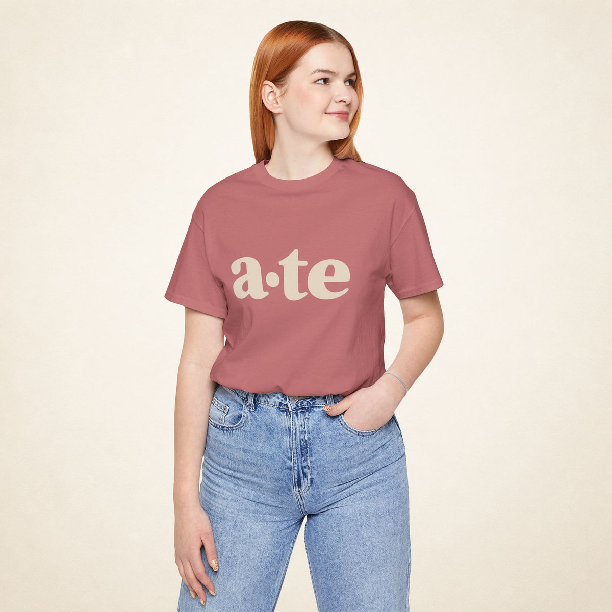 Model wearing the Mauve ATE Filipino T-shirt from MadeInPinas, front view showing a·te lettering.