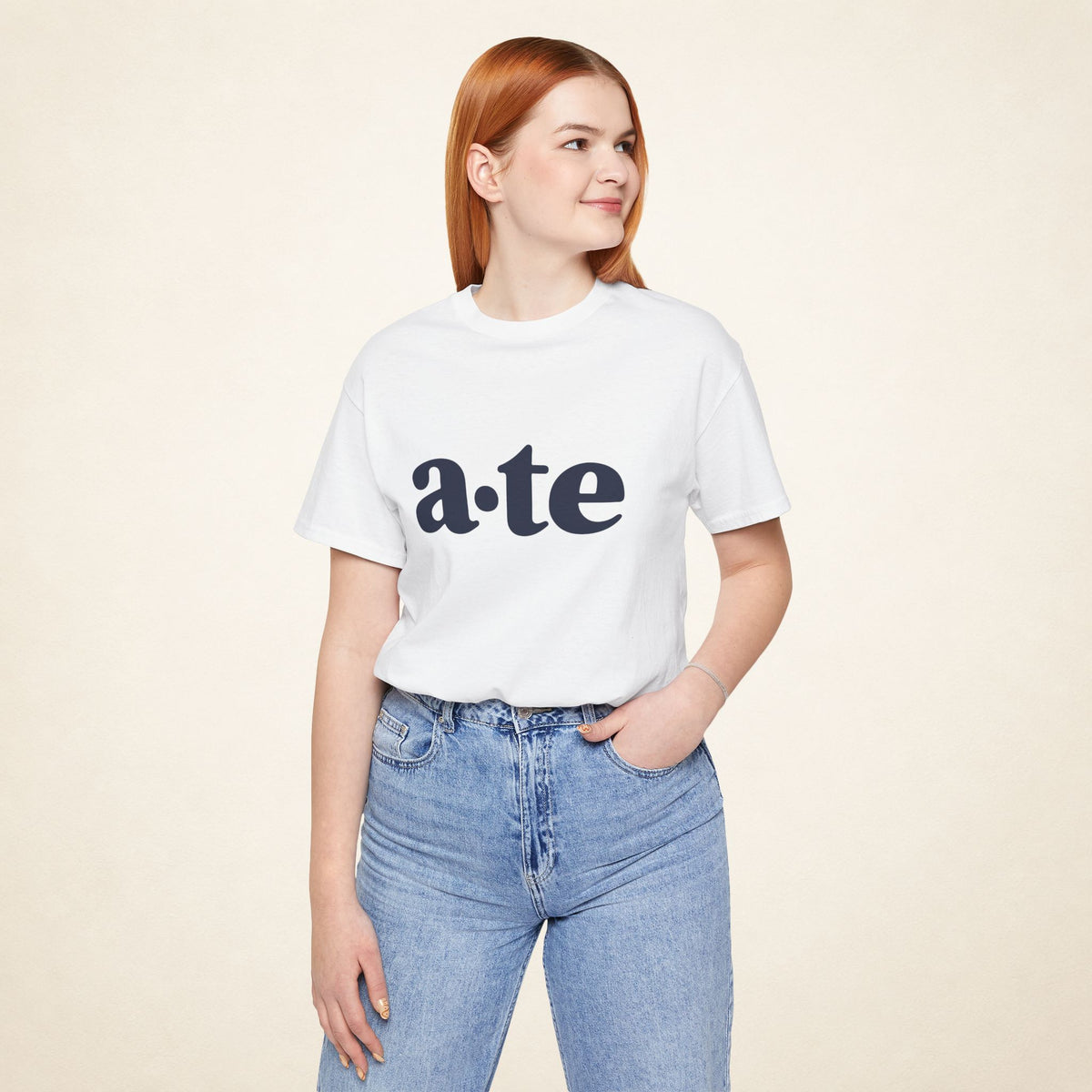 Model wearing the White ATE Filipino T-shirt from MadeInPinas, front view showing a·te lettering.