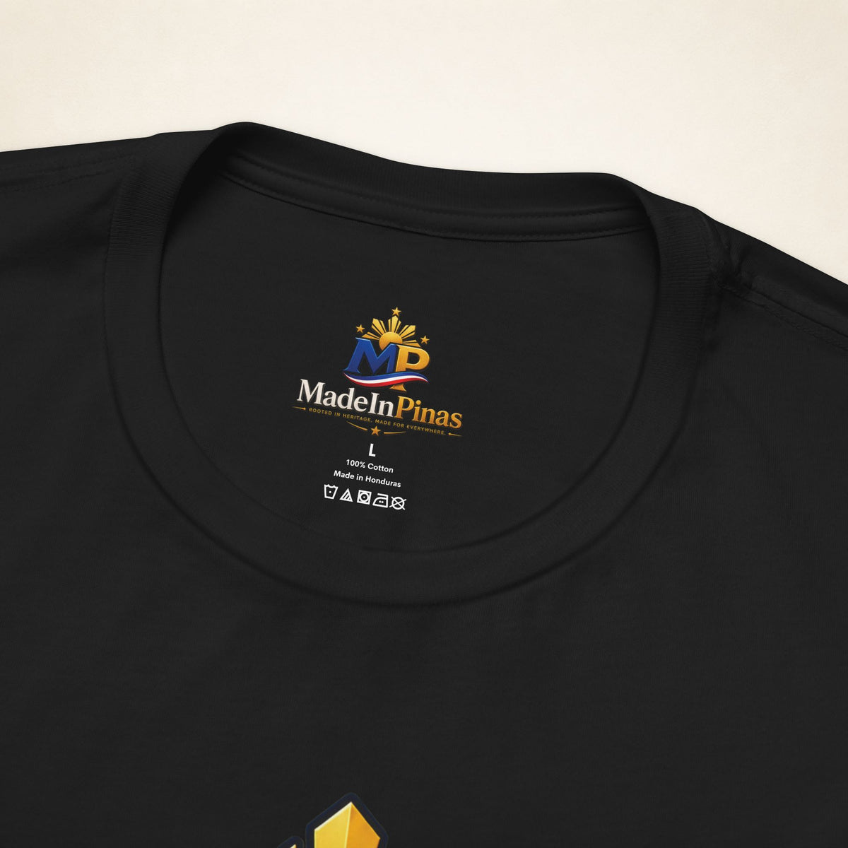 MadeInPinas Home Is Still Home Tee in Black, printed inner-neck label close-up