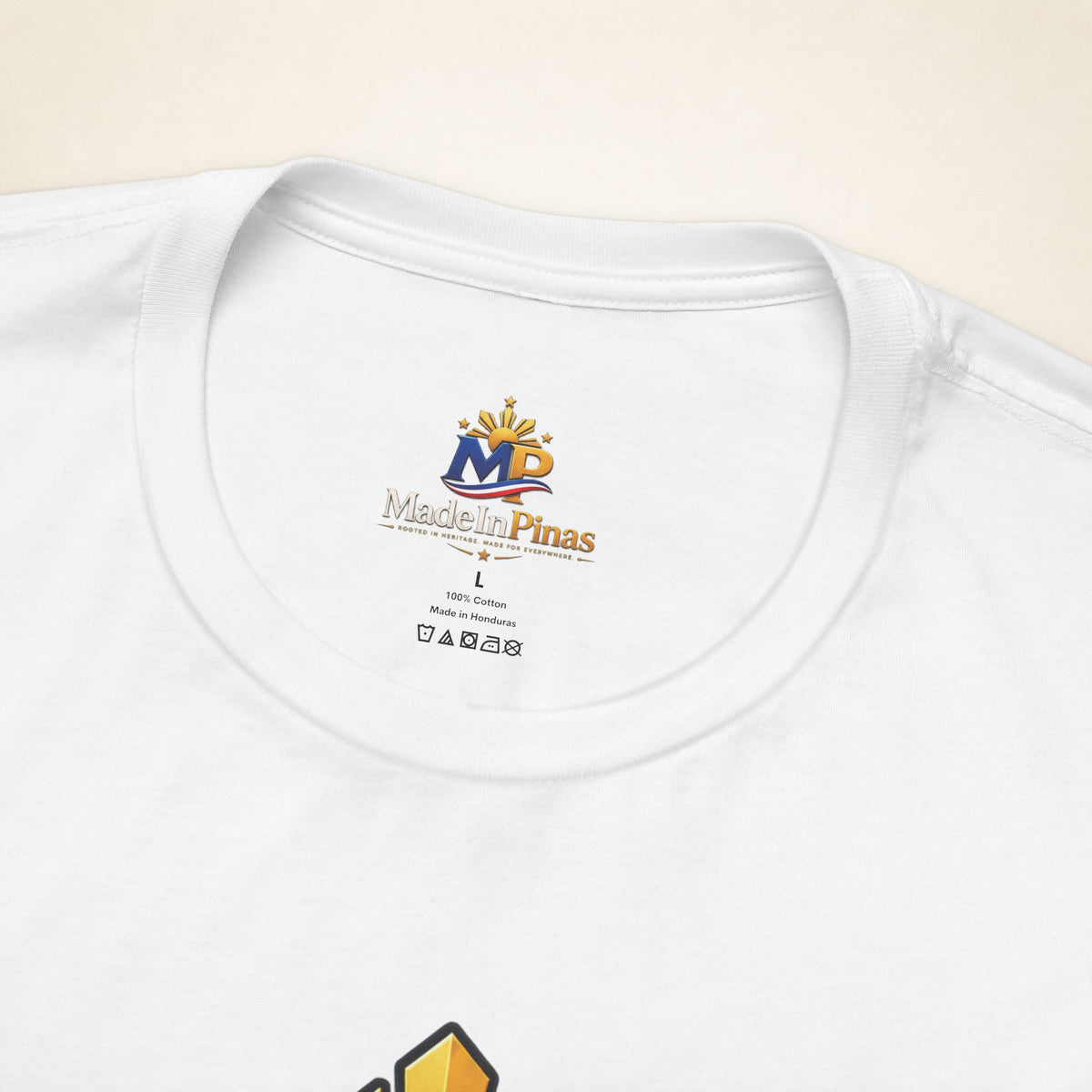 MadeInPinas Home Is Still Home Tee in White, printed inner-neck label close-up