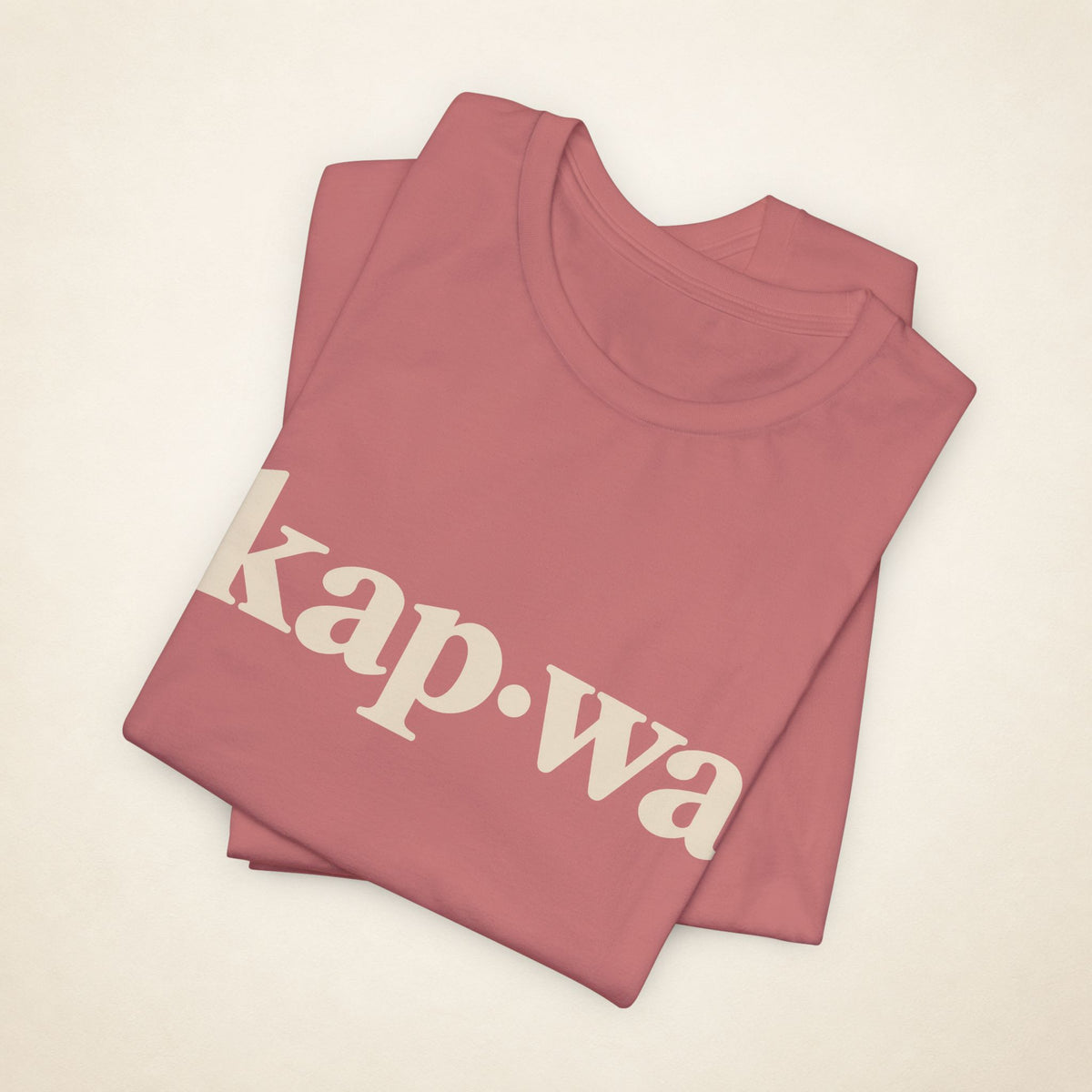 Folded Mauve MadeInPinas KAPWA T-shirt with the kap·wa front print visible.