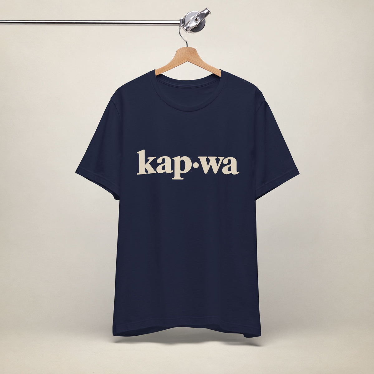 MadeInPinas KAPWA Filipino heritage T-shirt in Navy, hanging front view with minimalist kap·wa lettering.