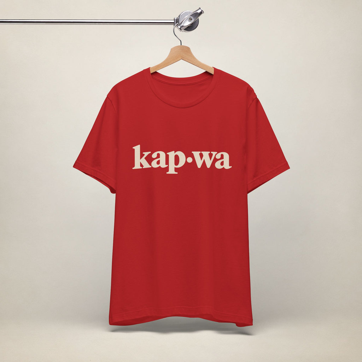 MadeInPinas KAPWA Filipino heritage T-shirt in Red, hanging front view with minimalist kap·wa lettering.