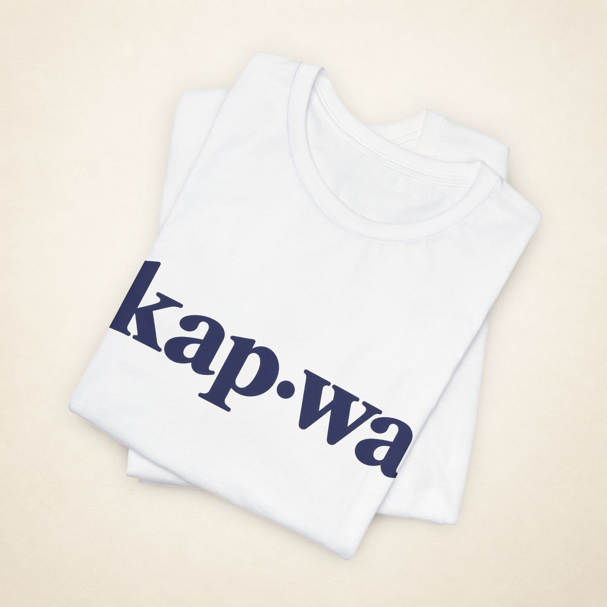 Folded White MadeInPinas KAPWA T-shirt with the kap·wa front print visible.