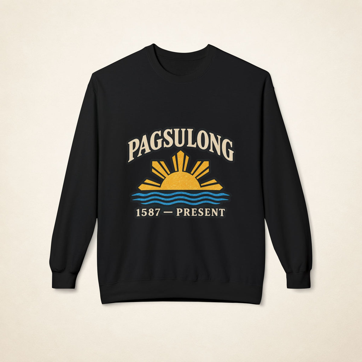 MadeInPinas PAGSULONG Filipino American heritage crewneck sweatshirt in Black, front view featuring a golden Philippine sun, blue waves, and 1587–PRESENT artwork.