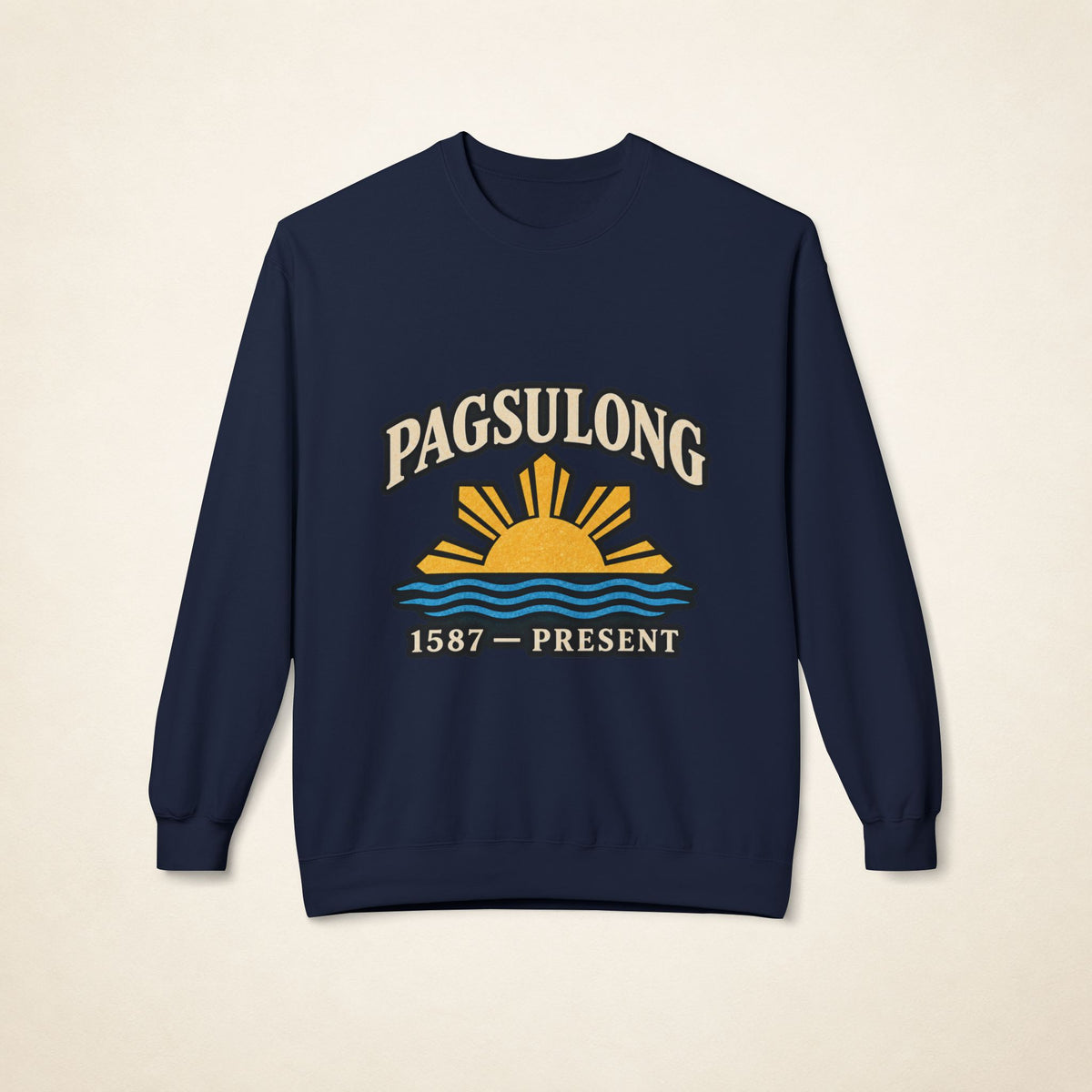 MadeInPinas PAGSULONG Filipino American heritage crewneck sweatshirt in Navy, front view featuring a golden rising sun, blue waves, and 1587–PRESENT typography.