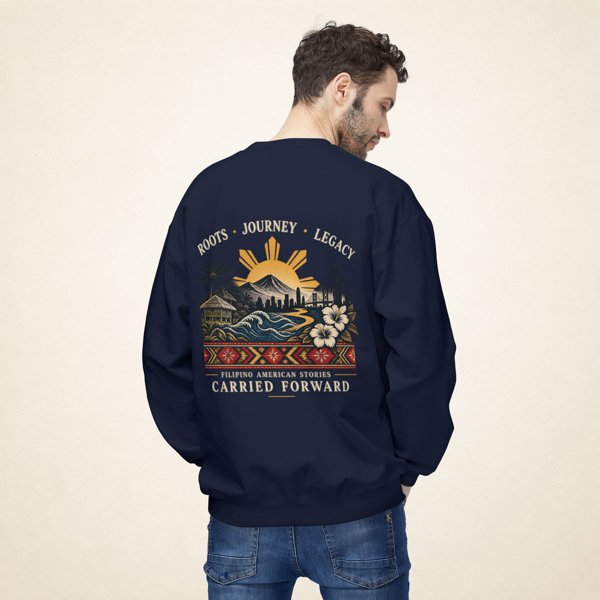 Male model wearing the navy PAGSULONG Filipino American heritage sweatshirt photographed from behind, showing the multicolored commemorative back artwork.